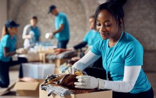 A young woman helping her community